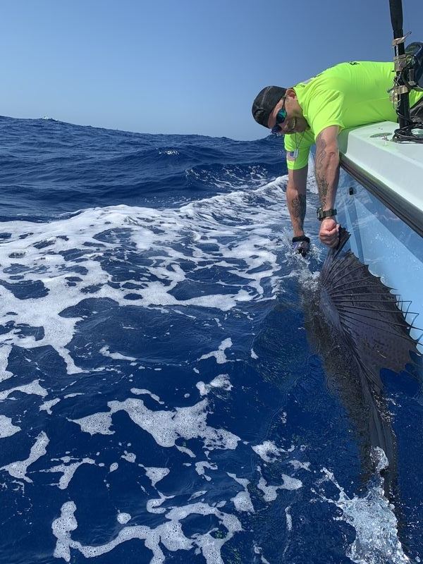 Deep sea fishing adventure in Fort Lauderdale with anglers catching trophy fish offshore